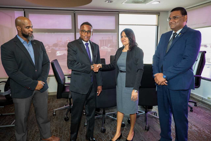 Newly-appointed Minister of Sport and Youth Affairs, the Honourable Phillip Watts (2nd from left) is greeted by (l-r) Deputy Permanent Secretary (Ag.) Mr. Gabre-Jesu Mc Tair (Sport), Deputy Permanent Secretary (Ag.) Savitri Balkaran (Youth Affairs) and Permanent Secretary (Ag.) Narine Charran
